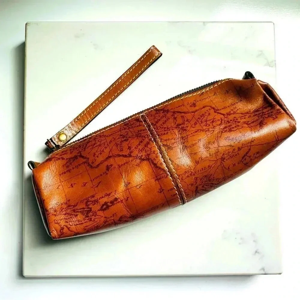 NWOT Patricia Nash Map Print Italian Leather Isla Cosmetic Bag Riot Rust